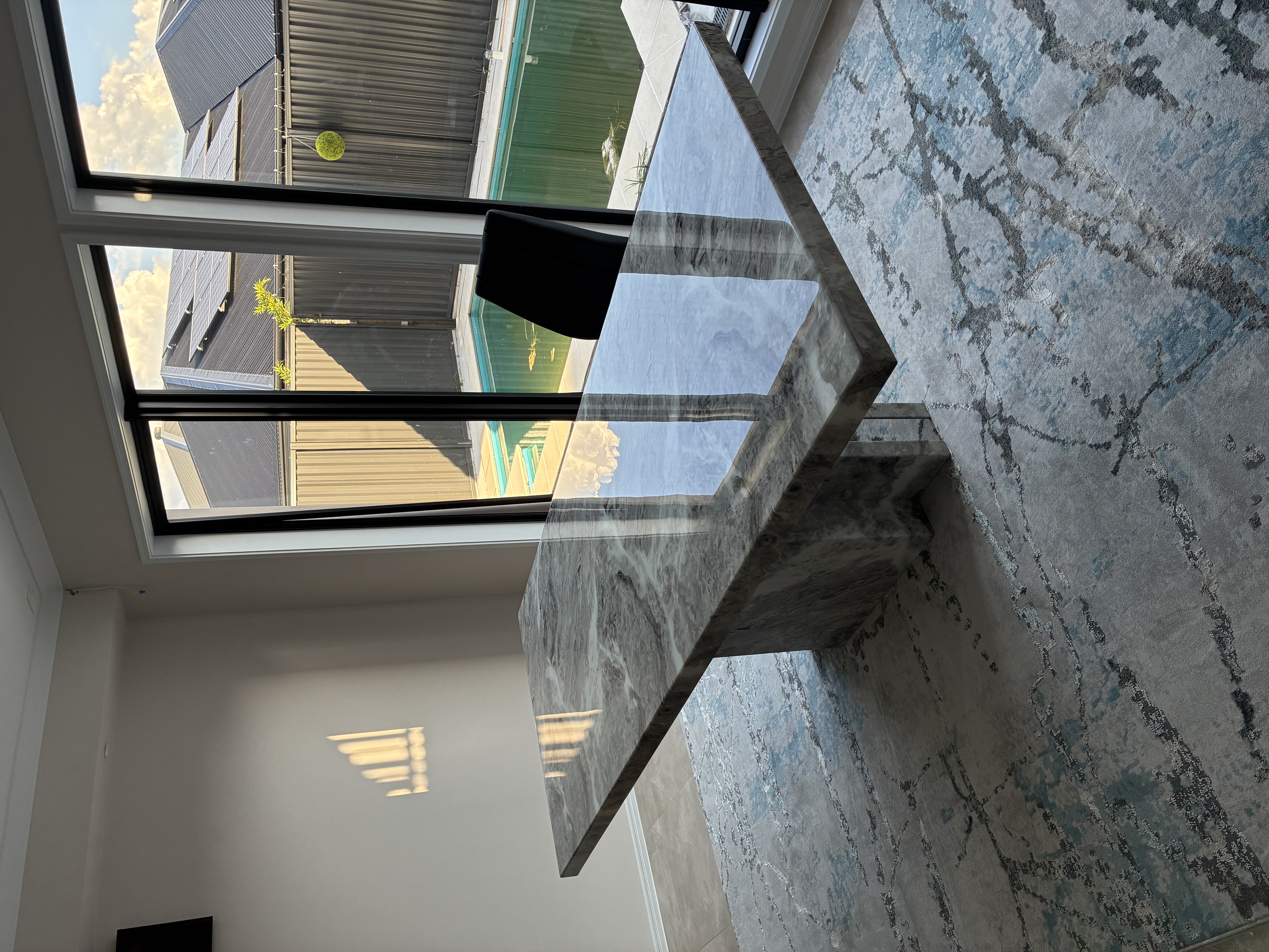 Marble dining table delivered and placed in customer home Brisbane